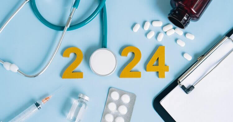 Medical devices and pills scattered with 2024 in the center
