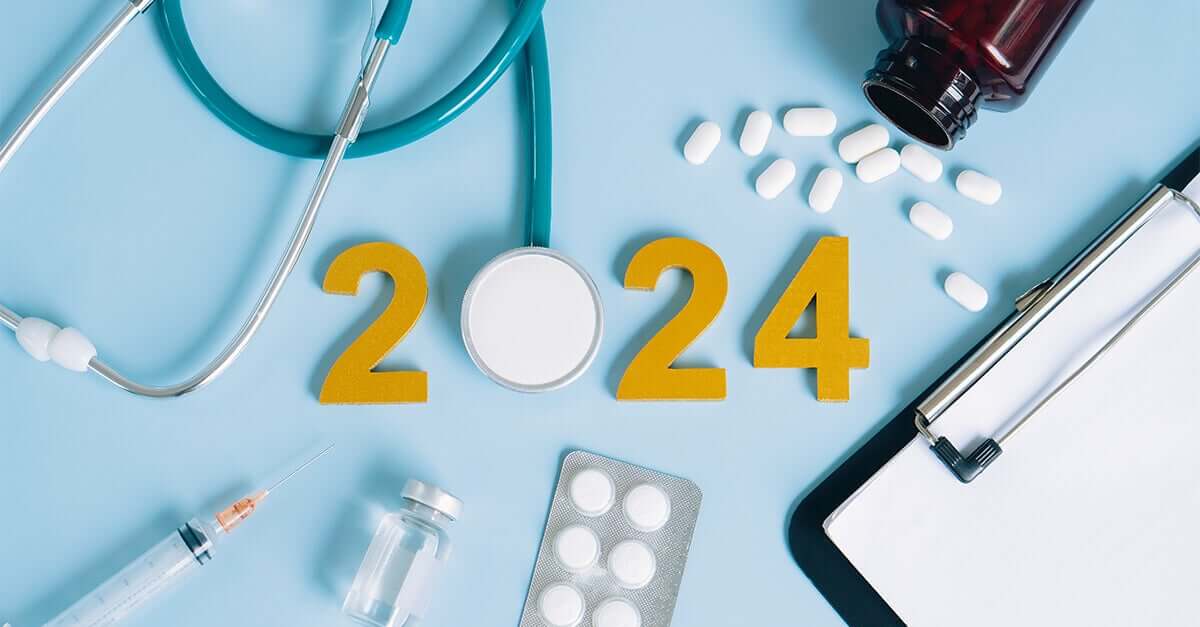 Medical devices and pills scattered with 2024 in the center