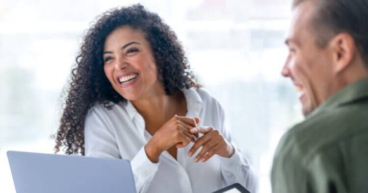Business woman interacting with team
