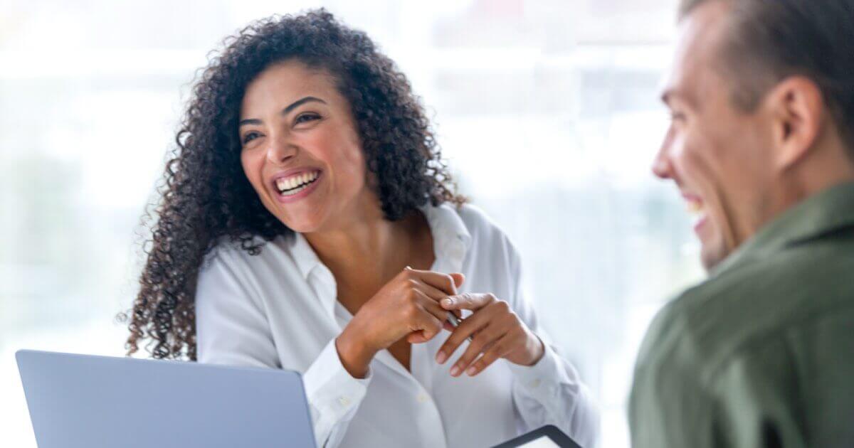 Business woman interacting with team