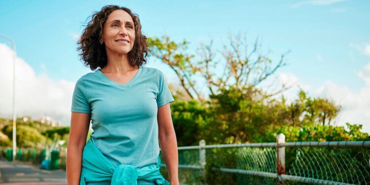 Mature women engaged in outdoor activity, going for walk
